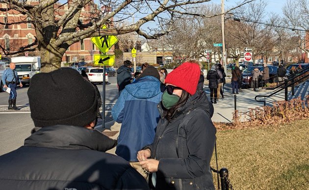 People lined up for test kits in Brighton