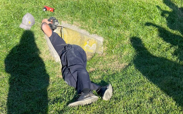 Firefighter at Millennium Park drain