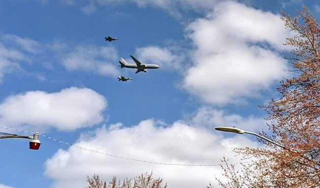 Fighter jets and a tanker plane