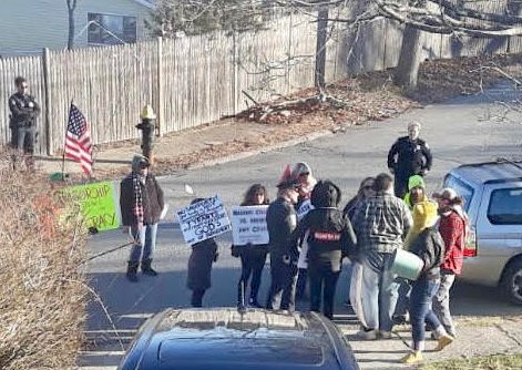 Bucket-drumming brigade outside Ricardo Arroyo's mother's house