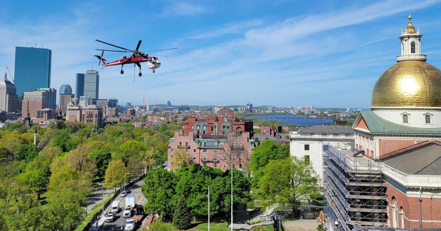 Cargo copter moving things to the McCormack Building