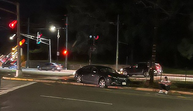 Car on Green Line tracks on Commonwealth Avenue at Chestnut Hill Avenue