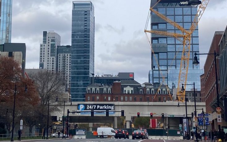 The remains of the old Govermment Center Garage - basically just the ground level and a sign advertising 24/7 parking