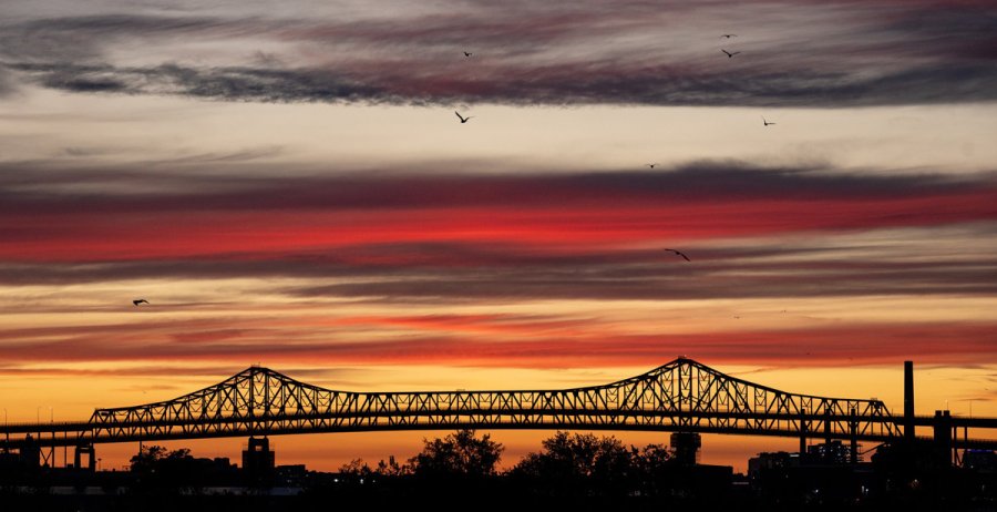 Sunset over the Tobin Bridge and birds