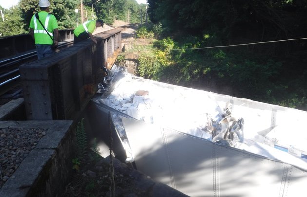 Inspecting where the trailer roof used to be