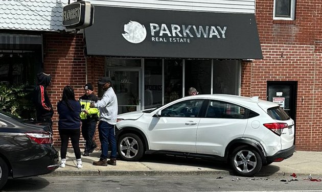 Car into building on South Street in Roslindale Square