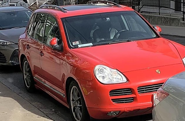 Abandoned Porsche Cayenne in Jamaica Plain