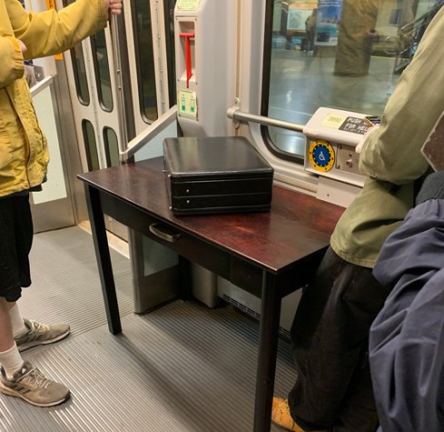 Desk, suitcase on the Green Line