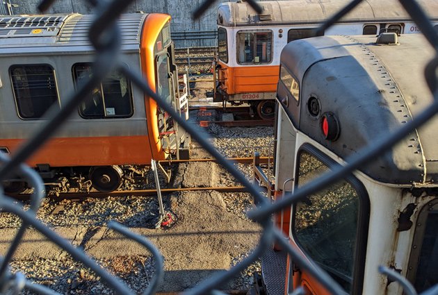 Old Orange Line cars at Forest Hills