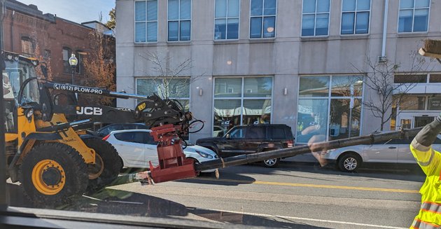 Trolley pole being removed on Centre Street in Jamaica Plain