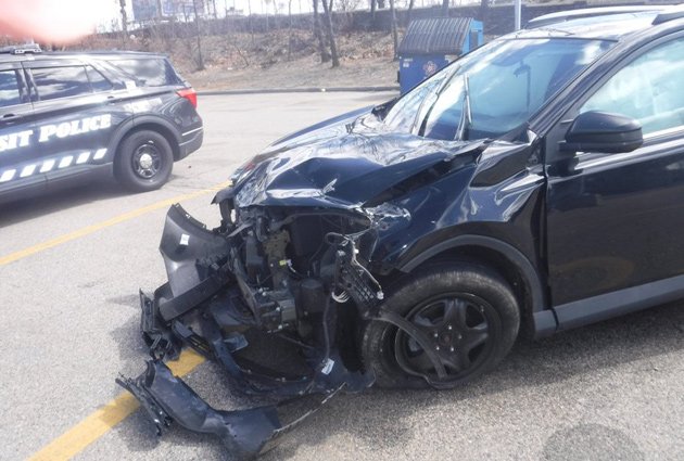 Wrecked car at Readville train station