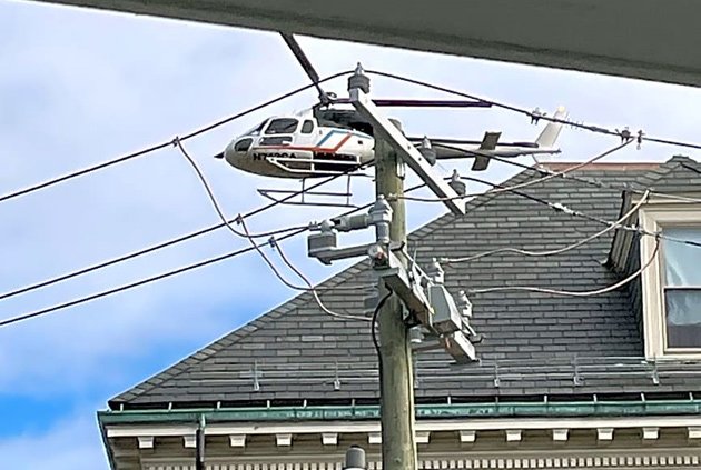 Copter over Northeast Corridor tracks in Roslindale