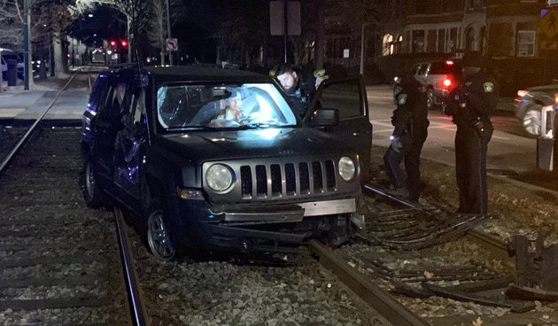 Smashed SUV on Green Line tracks