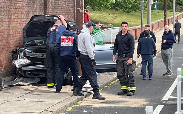 Remains of a car smashed into the wall outside Angell Animal Medical Center