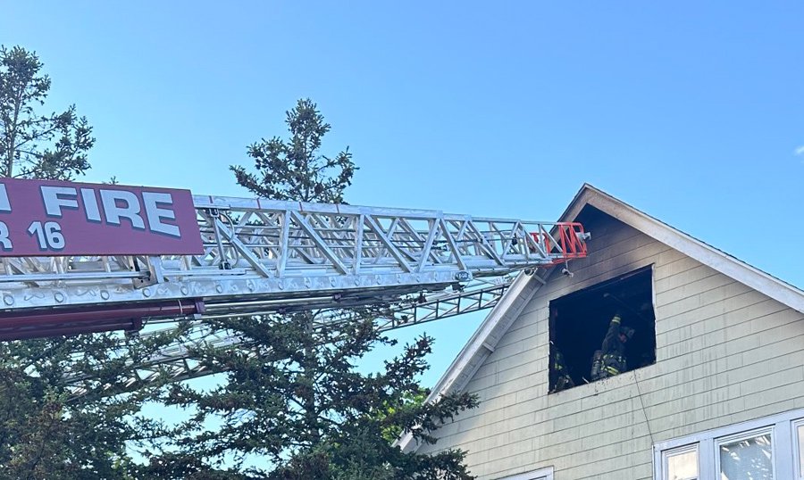 Fire ladder extending to roof at Averton Street fire