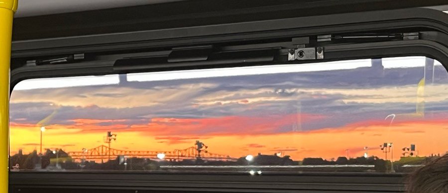 Sunset as seen from inside a Silver Line bus