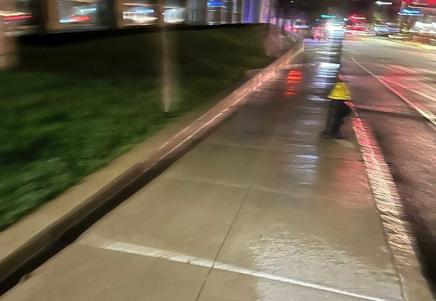 Wet sidewalk along GBH building