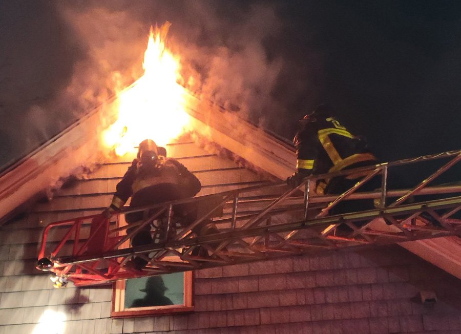 Firefighters and fire on Paine Street in Roslindale