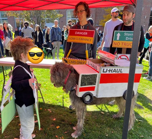 Dog dressed as a peeled-back U-Haul