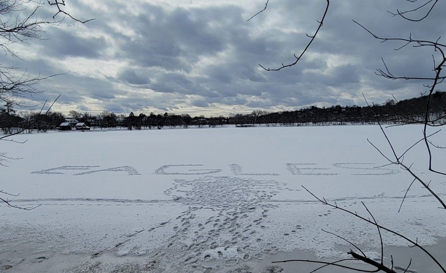 Somebody wrote EAGLES in the fresh snow on Jamaica Pond