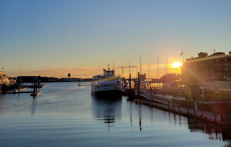 Sun coming up over Boston Harbor