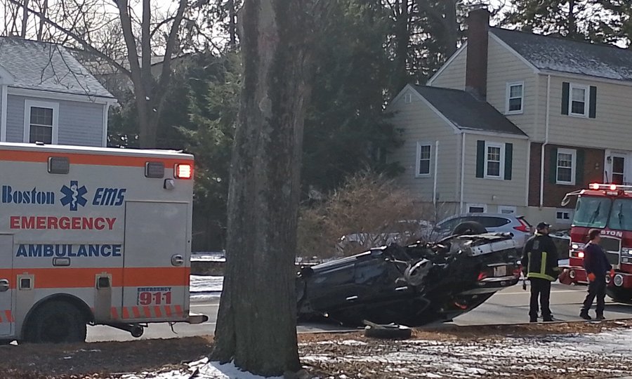 Car flipped on VFW Parkway