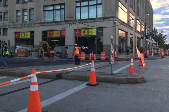 Workers getting Comm. Ave. bridge ready to be blocked