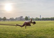 Man on a wire in Moakley Park