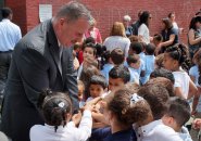 Boston Fire Commissioner Joe Finn and students at the Sumner School in Roslindale