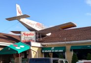 Crashed plane on roof of Napoles on Bennington Street in East Boston