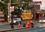 Sign advising of paving on June 31 in Allston