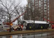 Truck load tipped over by the wind on Land Boulevard