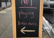 Sign that reads: NOT playing Xmas music