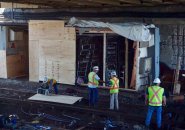 Workers at signal bungalow at JFK/UMass