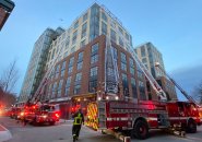 Building surrounded by firetrucks on East Dedham Street in the South End