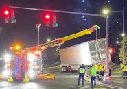 Big crane lifts big truck