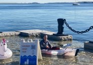 Guy in kayak on Long Wharf