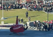 Santa getting off a helicopter in the North End