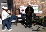 Playing the sax on Blue Hill Avenue