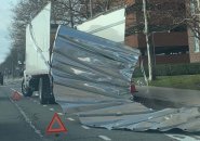 Box truck now playing the role of a sardine can on Western Avenue.