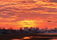 Bright orange sunset over Boston