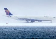 Delta jet from Amsterdam lands at Logan Airport