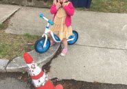 Kid disgusted with pothole
