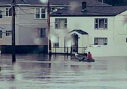 Man rowing a boat through Winthrop