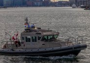 Santa on a State Police boat on the way to Chelsea