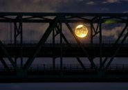 Moon rising through the Tobin Bridge
