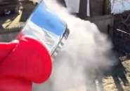 Throwing hot water up in the air