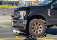 Remains of the bike under the wheels of a pickup