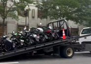 Mopeds about to be hauled off