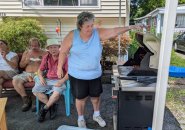 Donna Cabral grilling up some hot dogs